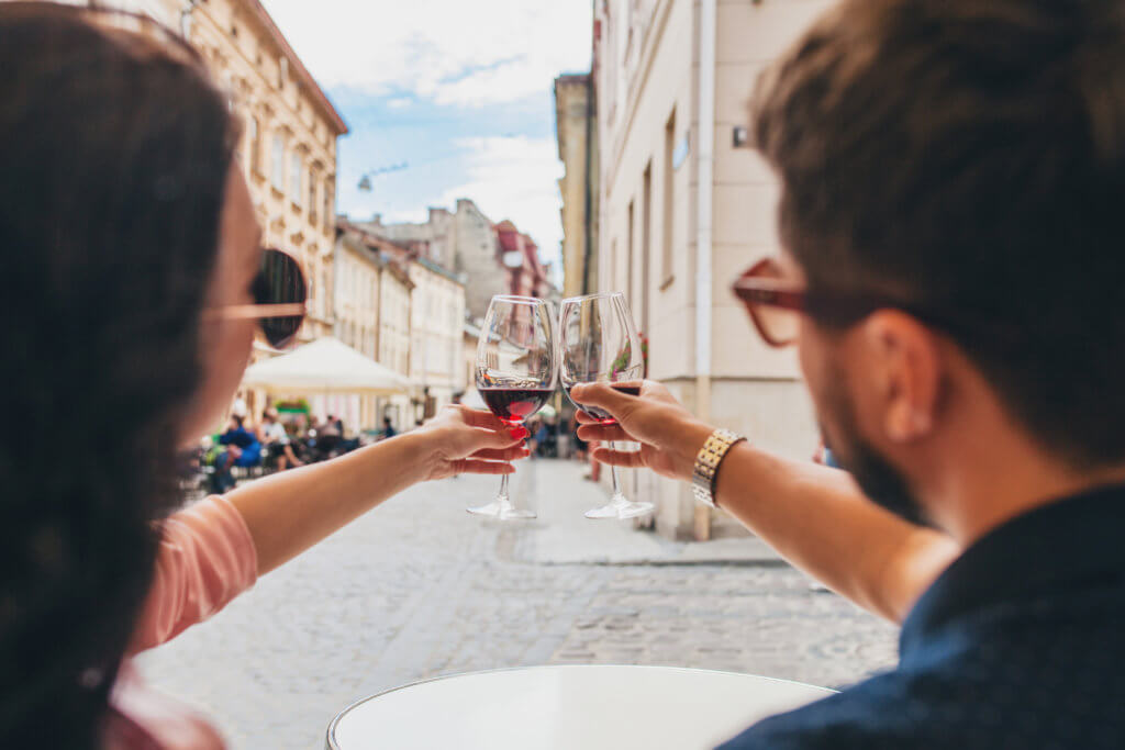 Millennials enjoying a glass of red wine 